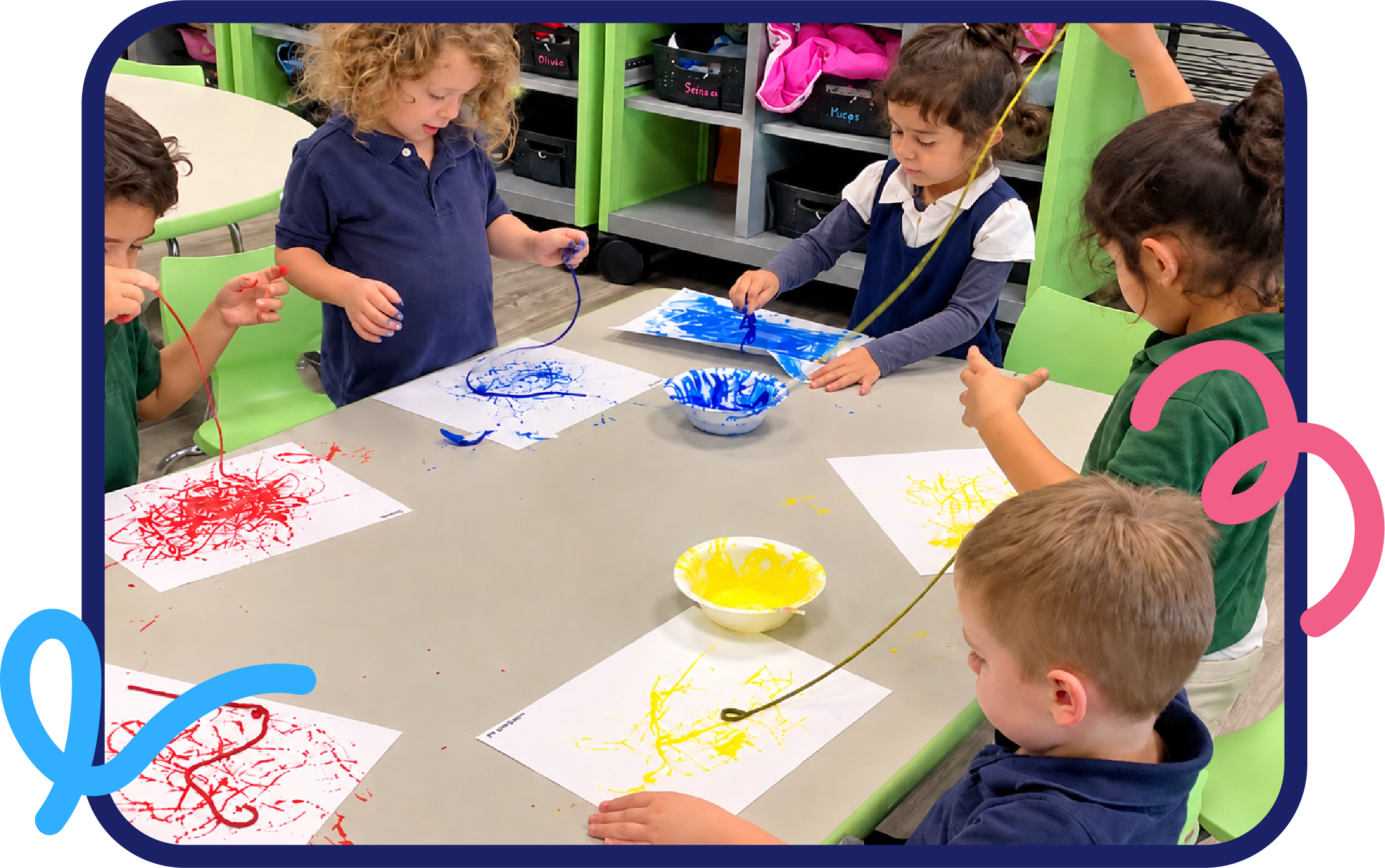Kids doing string painting art with primary colors at STEM Bright Beginnings daycare in Leander, TX