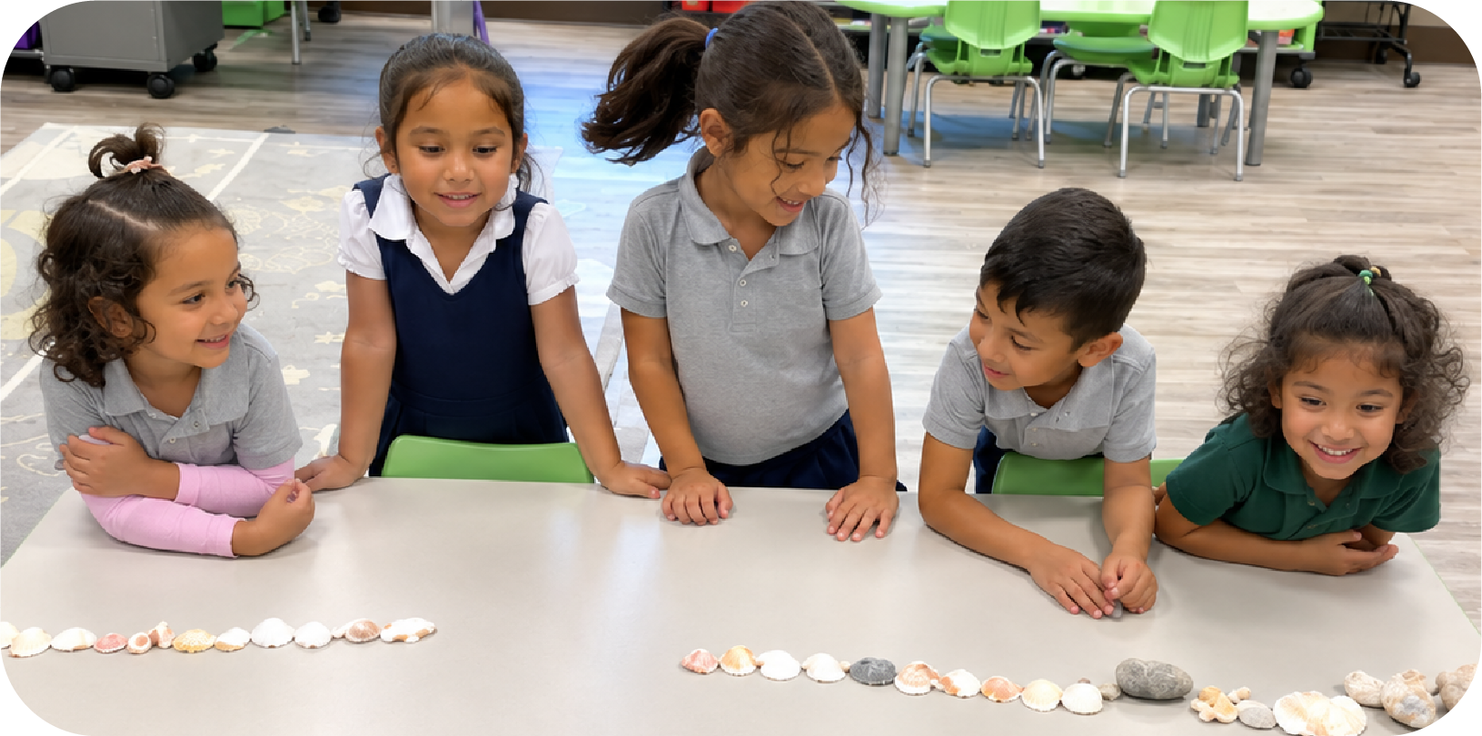 Preschoolers sorting shells and rocks by size at STEM Bright Beginnings daycare in Leander, TX