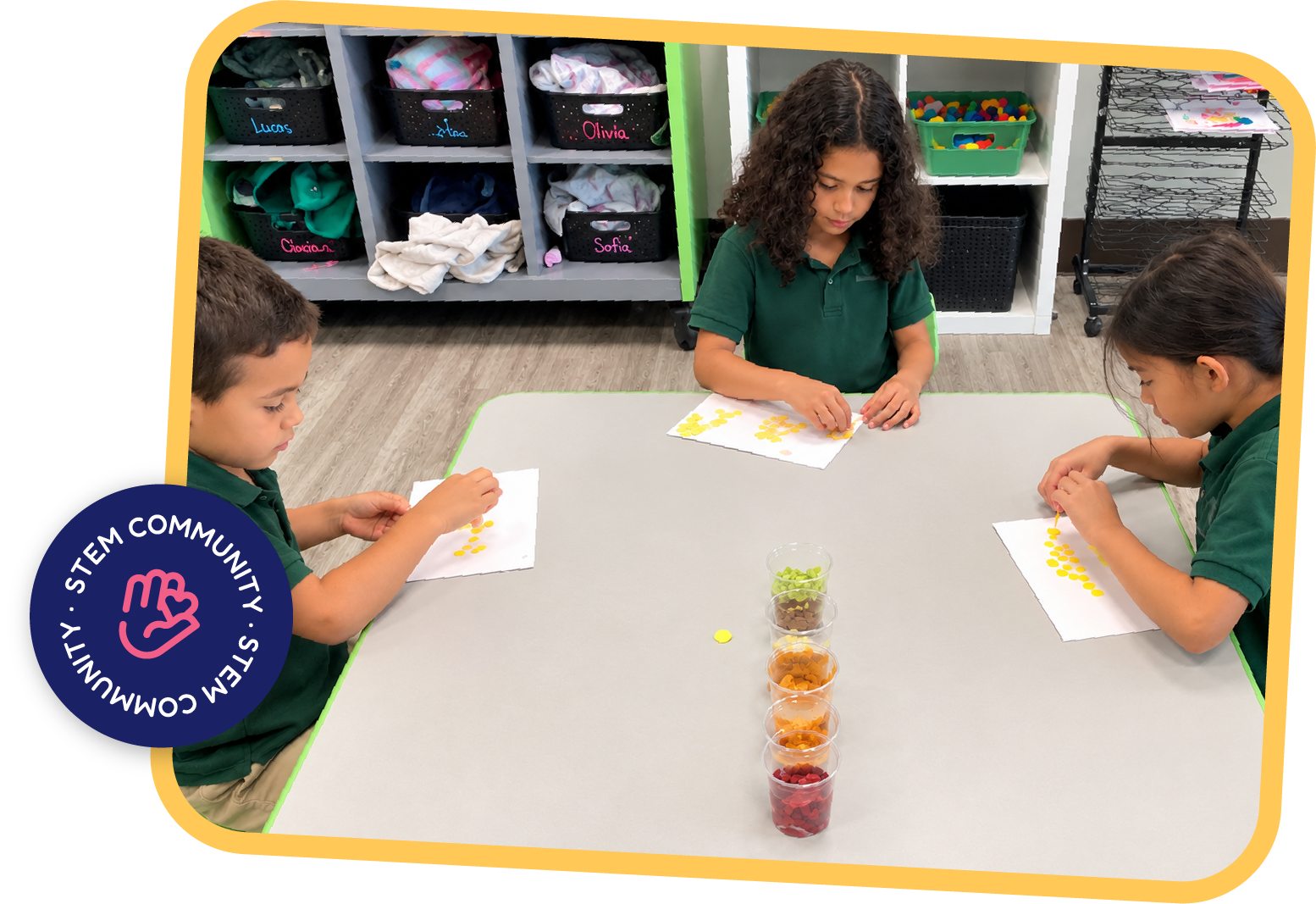 Three children arranging colorful buttons on paper as part of a classroom fine motor activity at STEM Bright Beginnings childcare and daycare in Leander, TX