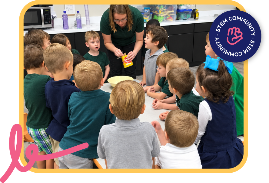 Teacher opening an ingredient packet as a group of children watch closely during a classroom cooking demonstration at STEM Bright Beginnings in Leander, TX